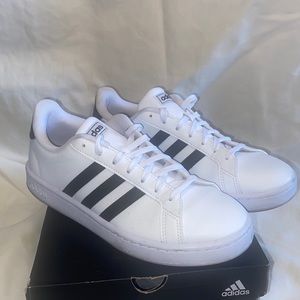Adidas Grand Court tennis sneakers.